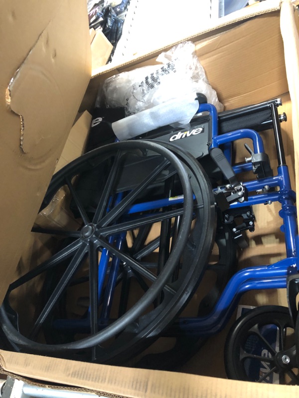 Photo 2 of (READ FULL POST) Drive Medical Blue Streak Lightweight Wheelchair with Swing-Away Footrests and Flip-Back Arms, Portable Folding 18" 