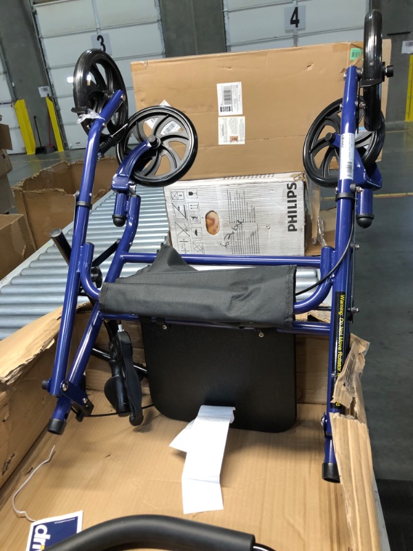 Photo 5 of ***USED - LIKELY MISSING PARTS - UNABLE TO VERIFY FUNCTIONALITY***
Drive Medical 10257BL-1 4 Wheel Rollator Walker With Seat, Steel Rolling Walker, Height Adjustable, 7.5" Wheels, Removable Back Support, 300 Pound Weight Capacity, Blue