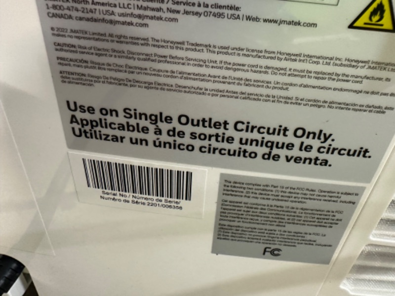Photo 4 of **NON-REFUNDABLE, PARTS ONLY** Honeywell 14,000 BTU Portable Air Conditioner for Bedroom, Living Room, Apartment, 115V, Cools Rooms Up to 700 Sq. Ft. with Dehumidifier & Fan, Continuous Drain Option, 24-hour Timer, Remote, White White Up to 500 Sq. Ft. Co