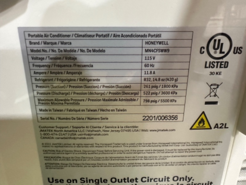 Photo 2 of **NON-REFUNDABLE, PARTS ONLY** Honeywell 14,000 BTU Portable Air Conditioner for Bedroom, Living Room, Apartment, 115V, Cools Rooms Up to 700 Sq. Ft. with Dehumidifier & Fan, Continuous Drain Option, 24-hour Timer, Remote, White White Up to 500 Sq. Ft. Co