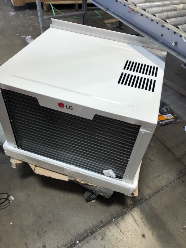 Photo 2 of (FOR PARTS) LG LW1824RD, White 18,000 Window Air Conditioner, 230/208V, 1,000 Sq.Ft. (25' x 40' Room Size), Quiet Operation, Electronic Control with Remote, 3 Cooling & Fan Speeds, Auto Restart, 18000 BTU 18000 BTU Cool Only 230V White