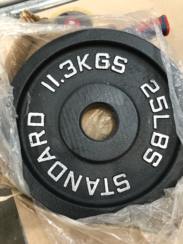 Photo 2 of 
Signature Fitness Cast Iron Plate Weight Plate for Strength Training and Weightlifting, Olympic or Standard, Multiple Sizes