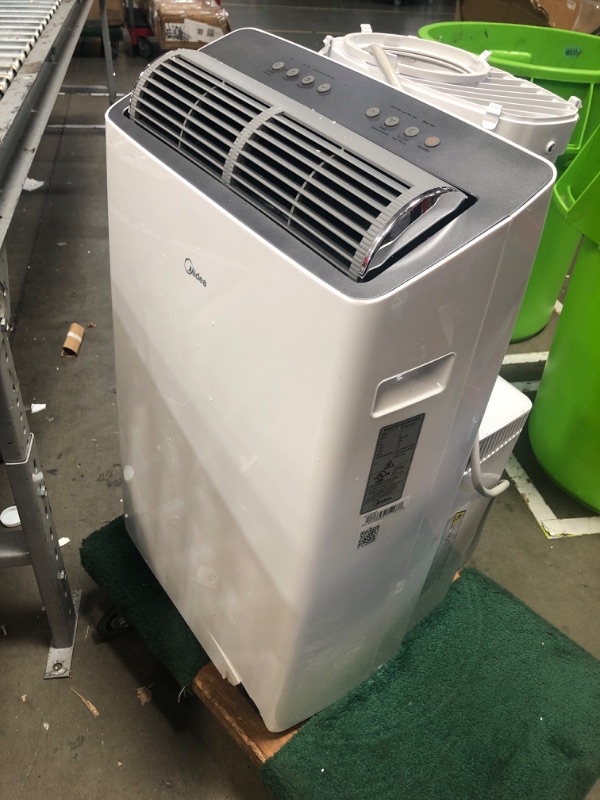 Photo 2 of **SEE NOTES** Midea Duo 14,000 BTU (12,000 BTU SACC) High Efficiency Inverter Quiet Portable Air Conditioner,with Heat up to 550 Sq. Ft.,white, Works with Alexa/Google Assistant, with Remote Control & Window Kit White 14,000 BTU with Heat