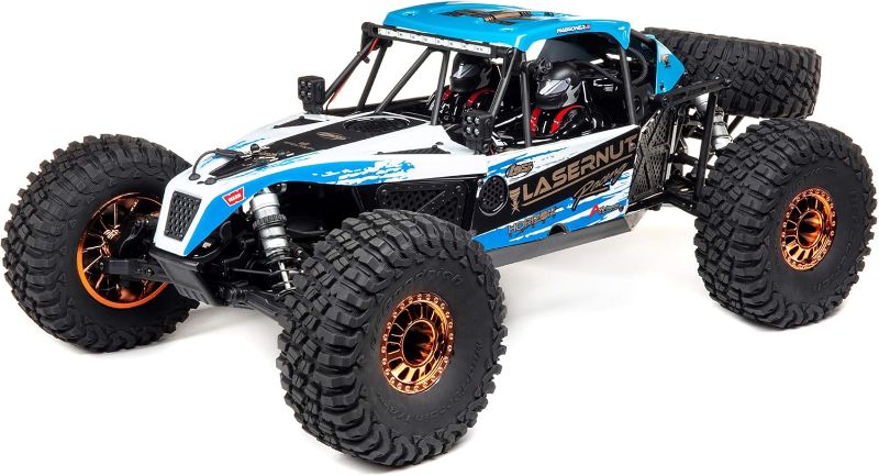 Photo 1 of ***USED - DAMAGED - MISSING PARTS - SEE COMMENTS***
Losi 1/10 Lasernut U4 4 Wheel Drive Brushless RTR Battery and Charger not included with Smart ESC Blue LOS03028T1