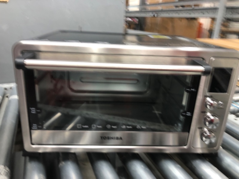 Photo 3 of ***USED - POWERS ON - UNABLE TO TEST FURTHER***
TOSHIBA AC25CEW-SS Large 6-Slice Convection Toaster Oven Countertop, 10-In-One with Toast, Pizza and Rotisserie, 1500W, Stainless Steel, Includes 6 Accessories Stainless Steel 25L