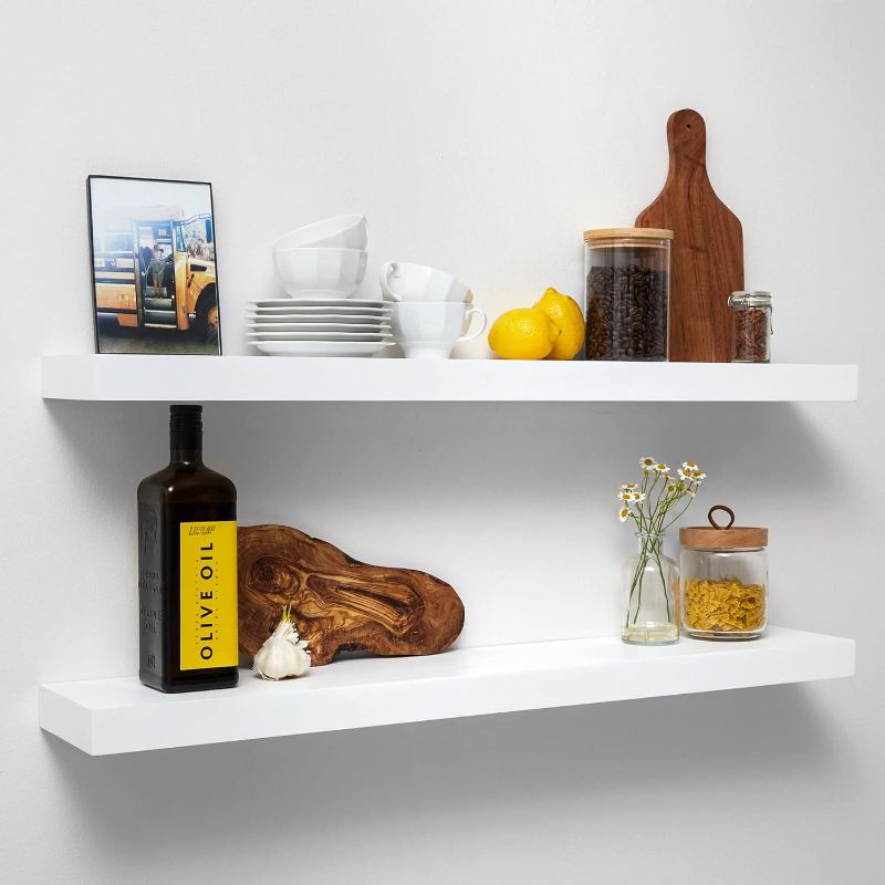 Photo 1 of (READ FULL POST) Homeforia White Floating Shelves 36 Inches Long, Premium Solid Wood, Long White Floating Shelves for Living Room, Heavy Duty Bracket, 36 x 6.5 x 1.75 inch, Set of 2
