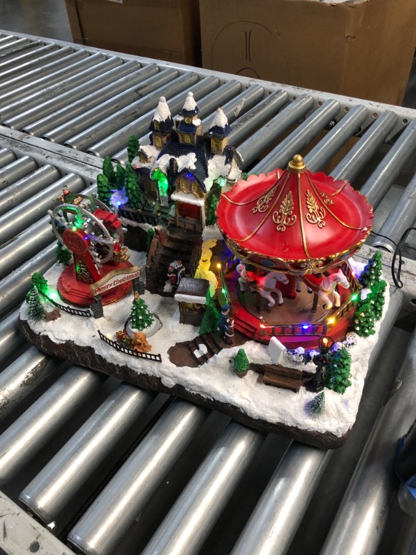 Photo 4 of (READ FULL POST) Alpine Corporation Animated Musical Christmas Theme Park Decor with 37 Multicolor LED Lights, 8 Holiday Songs, Moving Rides, and 5.6' Cord, 19" L x 12" W x 12" H
