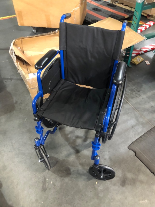 Photo 1 of (Broken wheel) 
Drive Medical Blue Streak Wheelchair with Flip Back Desk Arms, Elevating Leg Rests, 16 Inch Seat