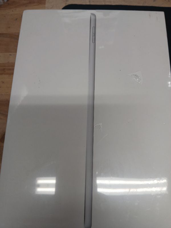 Photo 2 of Apple iPad (9th Generation): with A13 Bionic chip, 10.2-inch Retina Display, 64GB, Wi-Fi, 12MP front/8MP Back Camera, Touch ID, All-Day Battery Life – Silver---------SN----LWTYQDJPDY-------FACTORY SEALED----
