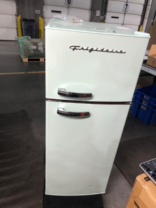 Photo 13 of ***USED - DAMAGED - UNTESTED - SEE COMMENTS***
Frigidaire EFR753-MINT 2 Door Apartment Size Refrigerator with Freezer, 7.5 cu ft, Retro, Mint