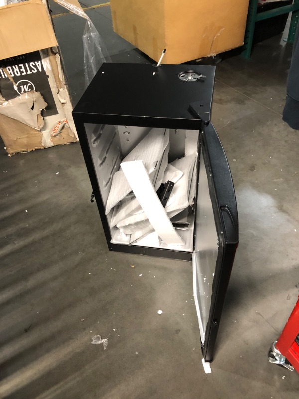 Photo 7 of ***DAMAGED - DENTED - NO PACKAGING - LIKELY MISSING PARTS - UNABLE TO VERIFY FUNCTIONALITY - SEE PICTURES***
Masterbuilt® 30-inch Digital Electric Vertical BBQ Smoker with Side Wood Chip Loader, Chrome Racks and 710 Cooking Square Inches in Black, Model M