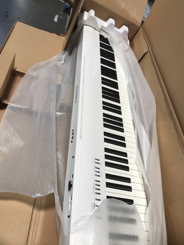 Photo 2 of * NEW* Roland FP-30X Digital Piano with Built-in Powerful Amplifier and Stereo Speakers. Rich Tone and Authentic Ivory 88-Note PHA-4 Keyboard for unrivalled Acoustic Feel and Sound. (FP-30X-WH), White
