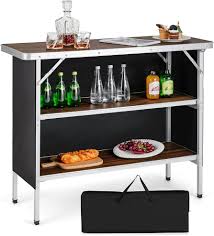 Photo 1 of  Folding Portable Bar Table, Tradeshow Podium Table for Indoor, Outdoor, Party, Picnic, Exhibition, Includes Carrying Case, Storage Shelf and Black Skirt, 38.39" x 15.16" x 34.25"