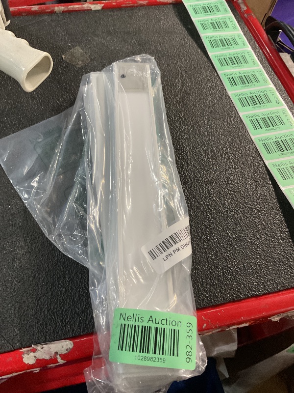Photo 2 of **MISSING ALL CORDS AND MISSING REMOTE**
56LED Under Cabinet Lighting Wireless w/Remote, 11.8'' Motion Sensor Light Indoor Rechargeable Under Cabinet Lights, Magnetic Closet Lights Battery Operated, Under Counter Lights for Kitchen (4)