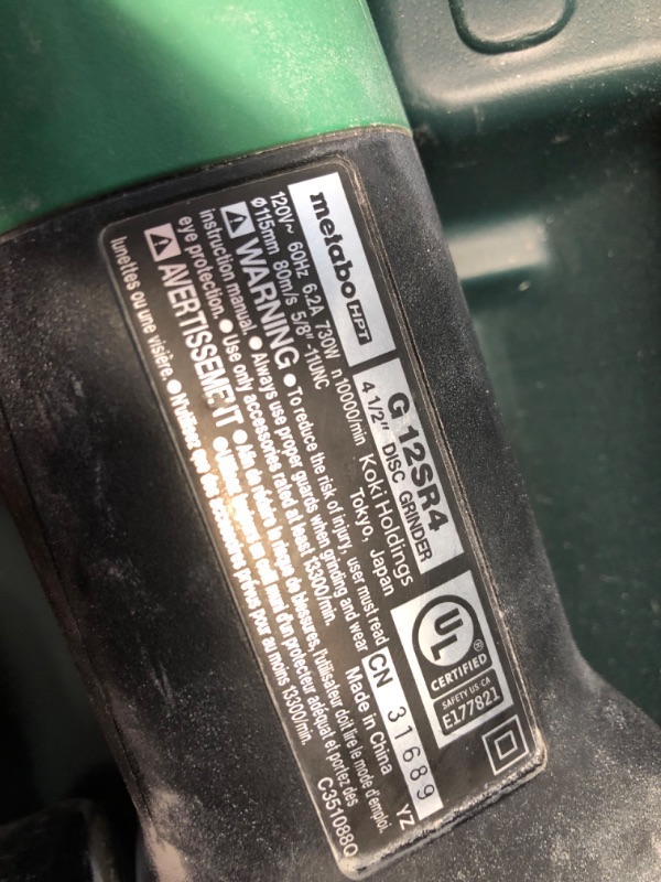 Photo 4 of ***USED - GRINDER AND GRINDING WHEELS ONLY - NO ACCESSORIES INCLUDED - DOESN'T TURN ON - UNABLE TO TROUBLESHOOT***
Metabo HPT 4.5-in 6.2 Amps Sliding Switch Corded Angle Grinder