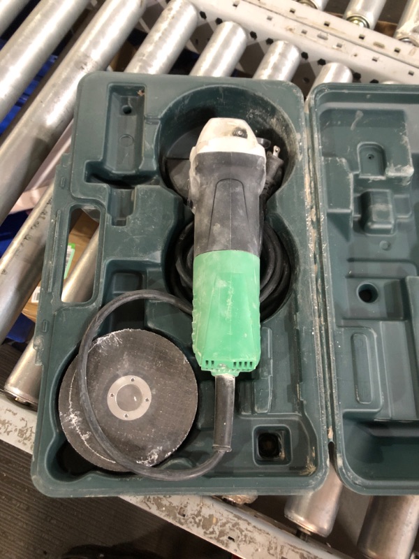 Photo 2 of ***USED - GRINDER AND GRINDING WHEELS ONLY - NO ACCESSORIES INCLUDED - DOESN'T TURN ON - UNABLE TO TROUBLESHOOT***
Metabo HPT 4.5-in 6.2 Amps Sliding Switch Corded Angle Grinder