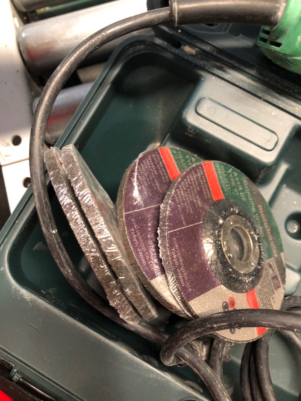 Photo 6 of ***USED - GRINDER AND GRINDING WHEELS ONLY - NO ACCESSORIES INCLUDED - DOESN'T TURN ON - UNABLE TO TROUBLESHOOT***
Metabo HPT 4.5-in 6.2 Amps Sliding Switch Corded Angle Grinder