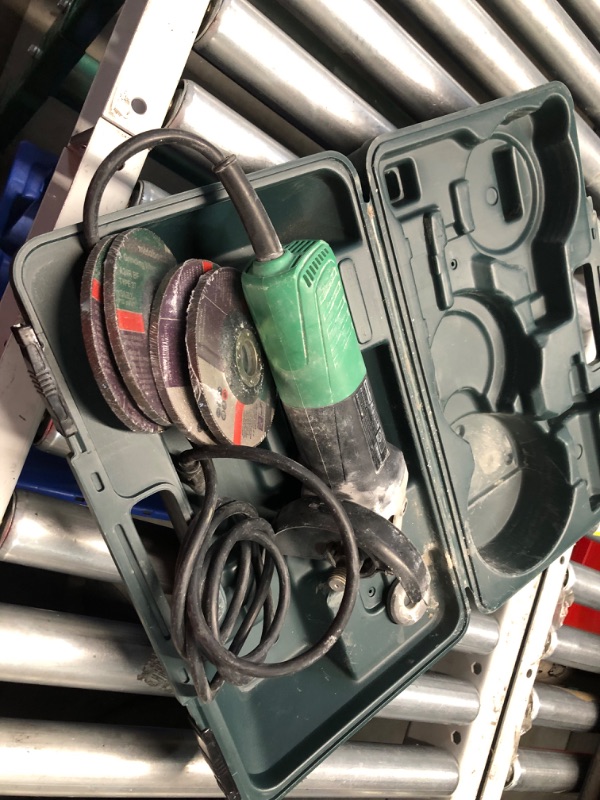 Photo 7 of ***USED - GRINDER AND GRINDING WHEELS ONLY - NO ACCESSORIES INCLUDED - DOESN'T TURN ON - UNABLE TO TROUBLESHOOT***
Metabo HPT 4.5-in 6.2 Amps Sliding Switch Corded Angle Grinder