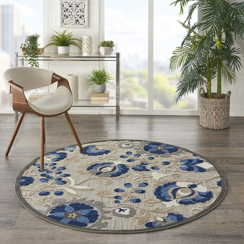 Photo 1 of Nourison Aloha Indoor/Outdoor Natural/Blue 4' x Round Area Rug