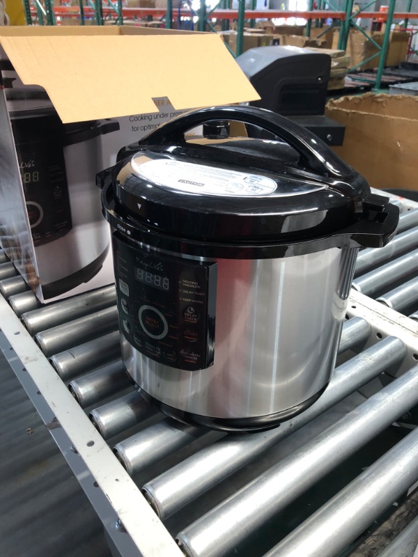 Photo 3 of ***USED - POWERS ON - UNABLE TO TEST FURTHER - LIKELY MISSING PARTS***
MegaChef 12 Quart Digital Pressure Cooker with 15 Preset Options and Glass Lid, Silver