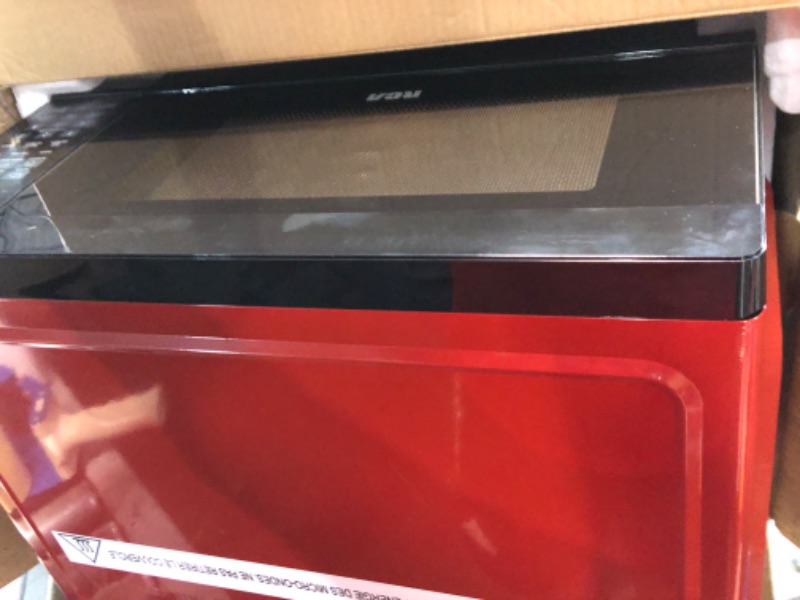 Photo 1 of ***USED - DAMAGED - SEE COMMENTS***
RCA RMW1132-RED 1.1 cu. ft. 1000W Microwave, Red