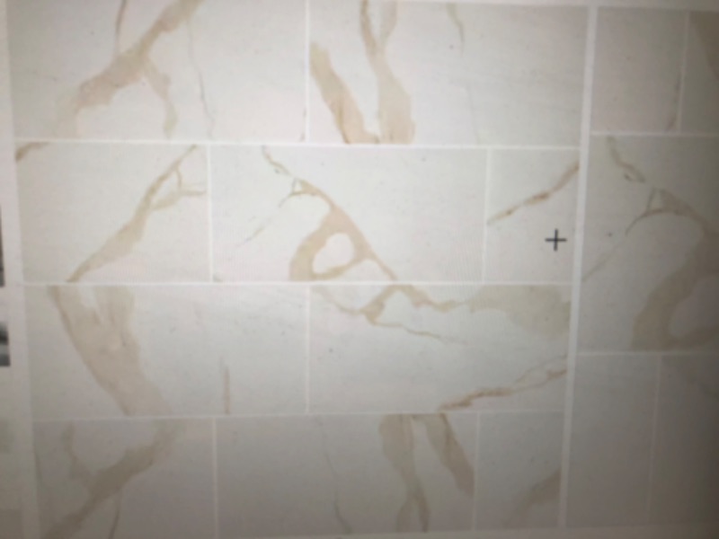 Photo 1 of **Like new 
Ader Calacatta 12 in. x 24 in. Matte Porcelain Floor and Wall Tile (16 sq. ft./Case)