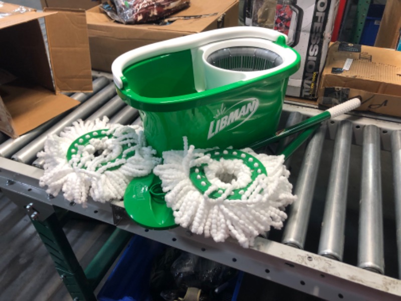 Photo 3 of ***USED - LIKELY MISSING PARTS - UNABLE TO VERIFY FUNCTIONALITY***
Libman Tornado Spin Mop System - Mop and Bucket with Wringer Set for Floor Cleaning - 2 Total Mop Heads Included, Green Spin Mop Plus 1 Refill