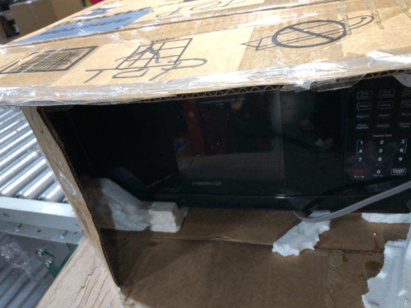 Photo 2 of ***HEAVILY USED AND DIRTY - LIKELY MISSING PARTS - UNABLE TO VERIFY FUNCTIONALITY***
Farberware Countertop Microwave 700 Watts, 0.7 Cu. Ft. - Microwave Oven With LED Lighting and Child Lock - Perfect for Apartments and Dorms - Easy Clean Grey Interior, Re