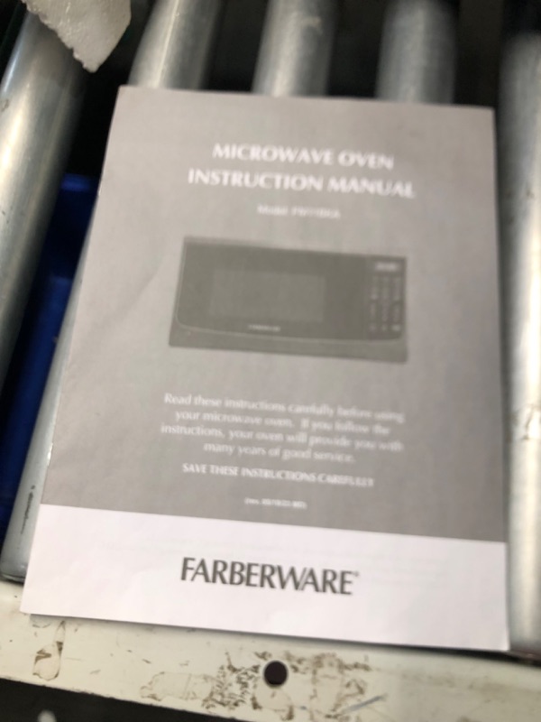 Photo 4 of ***HEAVILY USED AND DIRTY - LIKELY MISSING PARTS - UNABLE TO VERIFY FUNCTIONALITY***
Farberware Countertop Microwave 700 Watts, 0.7 Cu. Ft. - Microwave Oven With LED Lighting and Child Lock - Perfect for Apartments and Dorms - Easy Clean Grey Interior, Re