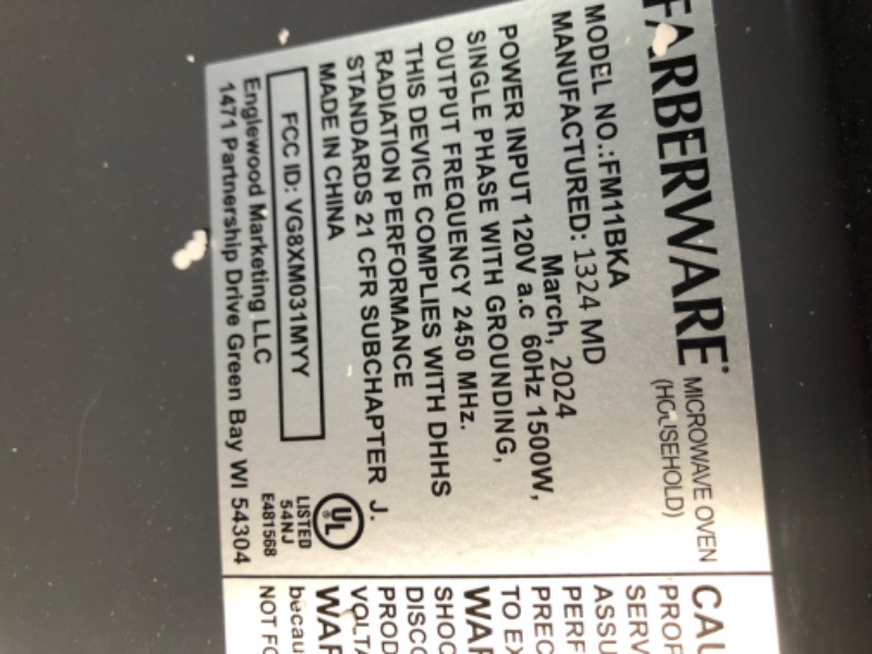 Photo 9 of ***HEAVILY USED AND DIRTY - LIKELY MISSING PARTS - UNABLE TO VERIFY FUNCTIONALITY***
Farberware Countertop Microwave 700 Watts, 0.7 Cu. Ft. - Microwave Oven With LED Lighting and Child Lock - Perfect for Apartments and Dorms - Easy Clean Grey Interior, Re