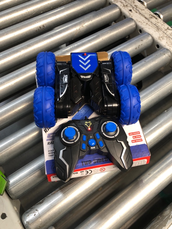 Photo 2 of (READ FULL POST) RC Stunt Cars, Remote Control Car 2.4Ghz Stunt Car with Double Sided 360-degree Flips Rotating Car Toy, Rechargeable 4WD Off Road RC Car Toys for Kids 3 4 5 6 7 8-12 Year Old Boys Girls Birthday Gift Blue