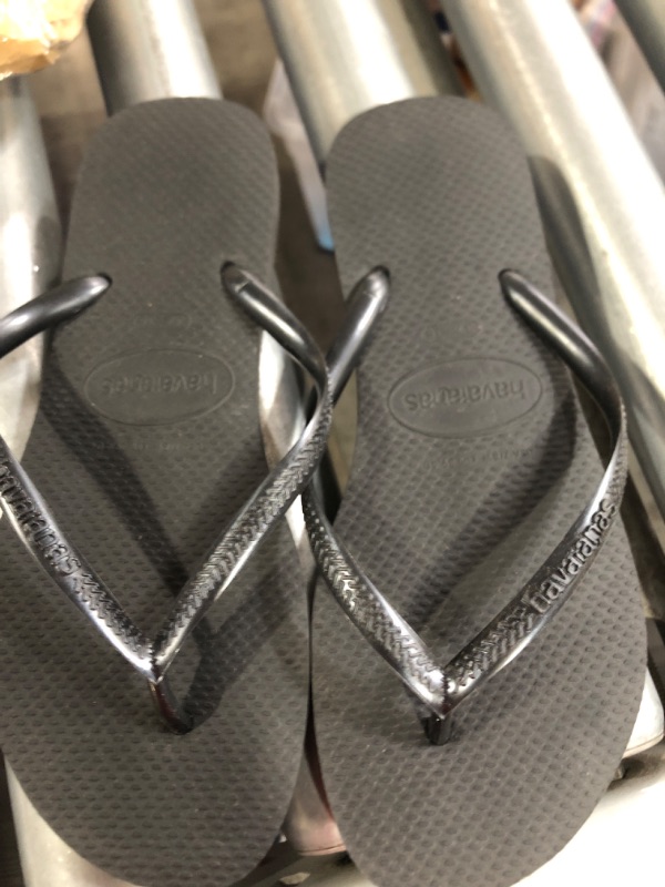 Photo 2 of (see all images)Havaianas Women's Slim Crystal Glamour Sw Flip Flop Sandal Big Kid (8-12 Years) 7-8 Black