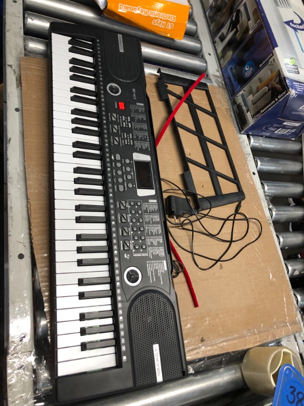 Photo 2 of **NON REFUNDABLE ITEM**(FOR PARTS ONLY)
61 key keyboard piano, Electronic Digital Piano with Built-In Speaker Microphone, Sheet Stand and Power Supply, Portable piano Keyboard Gift Teaching for Beginners Black