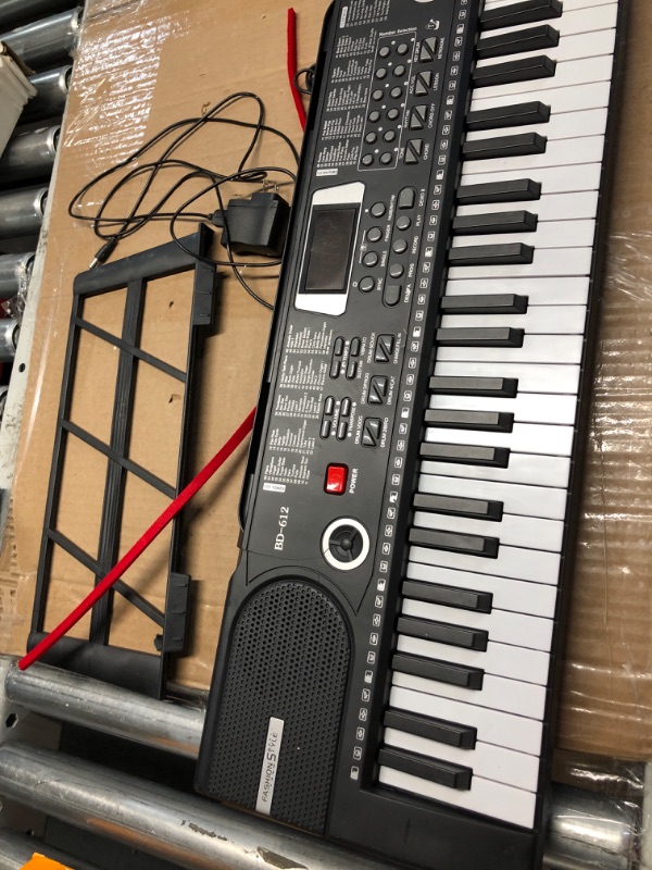 Photo 3 of **NON REFUNDABLE ITEM**(FOR PARTS ONLY)
61 key keyboard piano, Electronic Digital Piano with Built-In Speaker Microphone, Sheet Stand and Power Supply, Portable piano Keyboard Gift Teaching for Beginners Black