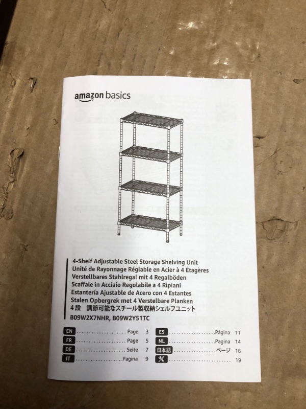 Photo 6 of **READ NOTES***
Amazon Basics 4-Shelf Adjustable, Storage Shelving Unit, (200 Pound Loading Capacity per Shelf), Steel Organizer Wire Rack, 13.4"D x 23.2"W x 48"H, Black 4-Shelf Black