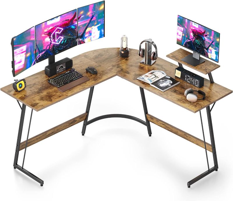 Photo 1 of ***UNABLE TO IDENTIFY EXACT ITEM - STOCK PHOTO FOR REFERENCE ONLY - ACTUAL ITEM MAY DIFFER - SEE COMMENTS***
Cubiker L Shaped Desk, Computer Corner Desk, Gaming Desk with Monitor Stand, Home Office Study Writing Workstation, Space-Saving, Rustic Brown