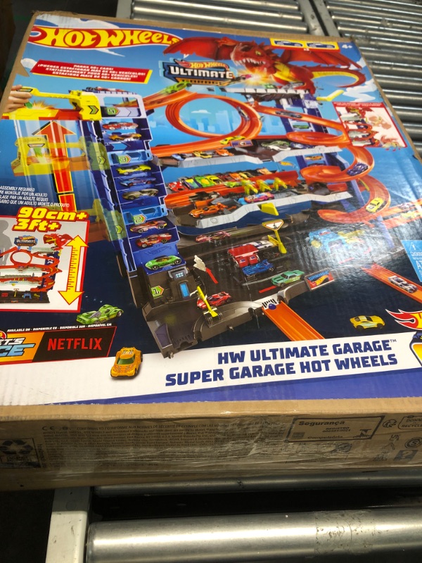 Photo 4 of (READ FULL POST) Hot Wheels City Ultimate Garage Playset with 2 Die-Cast Cars, Toy Storage for 50+ 1:64 Scale Cars, 4 Levels of Track Play, Defeat The Dragon