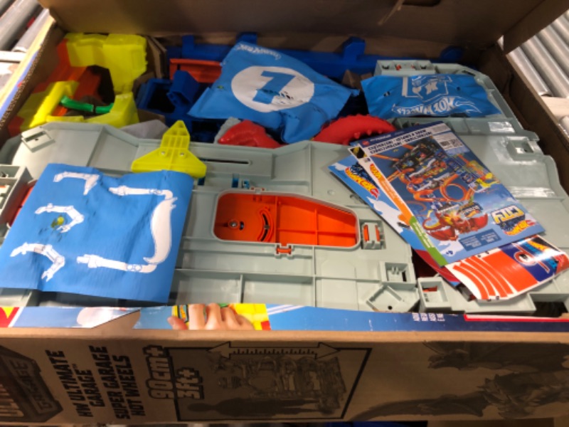 Photo 3 of (READ FULL POST) Hot Wheels City Ultimate Garage Playset with 2 Die-Cast Cars, Toy Storage for 50+ 1:64 Scale Cars, 4 Levels of Track Play, Defeat The Dragon