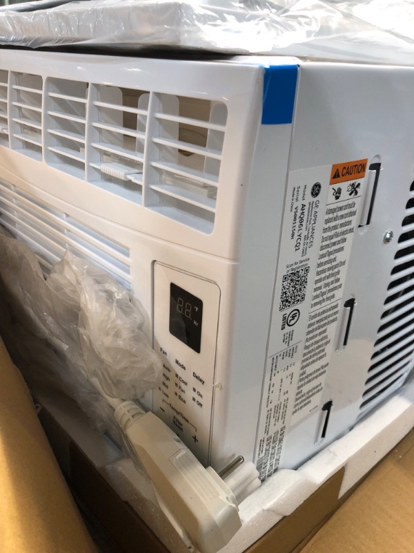 Photo 4 of ***USED - MAJOR DAMAGE - SIDES CAVED IN - SEE PICTURES - DOESN'T POWER ON - UNABLE TO TROUBLESHOOT***
GE 6,000 BTU Electronic Window Air Conditioner for Small Rooms up to 250 sq ft.
