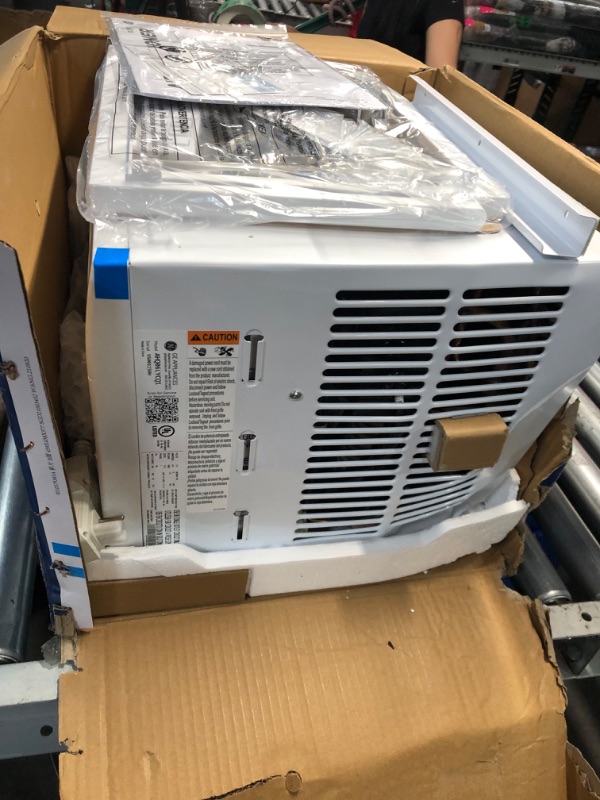 Photo 2 of ***USED - MAJOR DAMAGE - SIDES CAVED IN - SEE PICTURES - DOESN'T POWER ON - UNABLE TO TROUBLESHOOT***
GE 6,000 BTU Electronic Window Air Conditioner for Small Rooms up to 250 sq ft.
