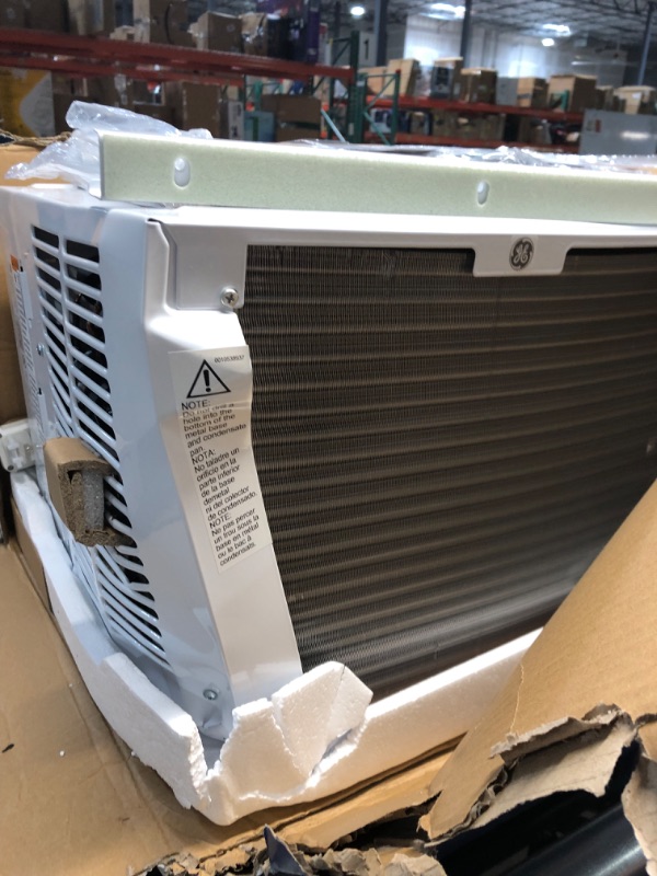 Photo 3 of ***USED - MAJOR DAMAGE - SIDES CAVED IN - SEE PICTURES - DOESN'T POWER ON - UNABLE TO TROUBLESHOOT***
GE 6,000 BTU Electronic Window Air Conditioner for Small Rooms up to 250 sq ft.
