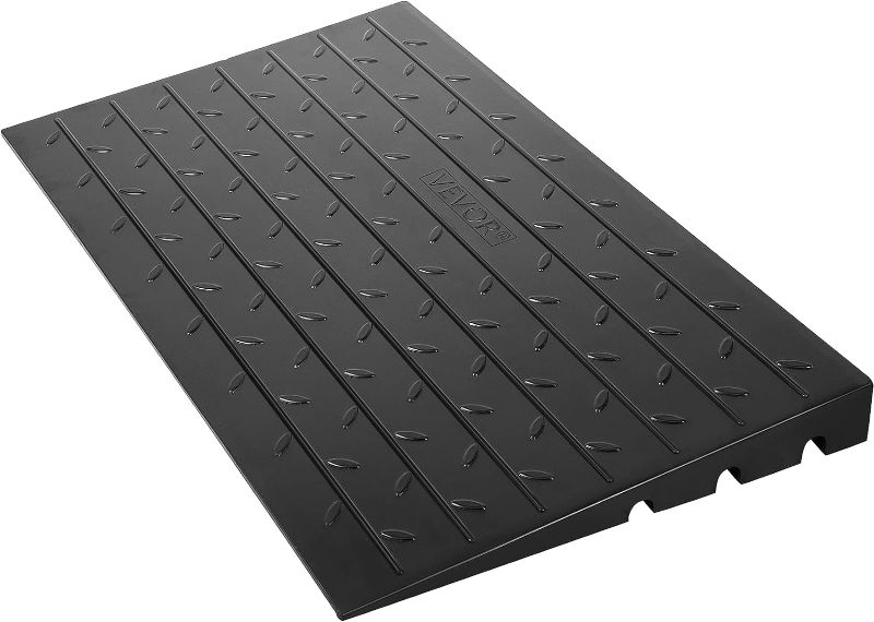 Photo 1 of (HEAVILY USED/ MINOR DAMAGE) 
VEVOR Rubber Threshold Ramp, 4" Rise Threshold Ramp Doorway, 3 Channels Cord Cover Rubber Solid Threshold Ramp, Rubber Angled Entry Rated 2200 Lbs Load Capacity for Wheelchair and Scooter Black