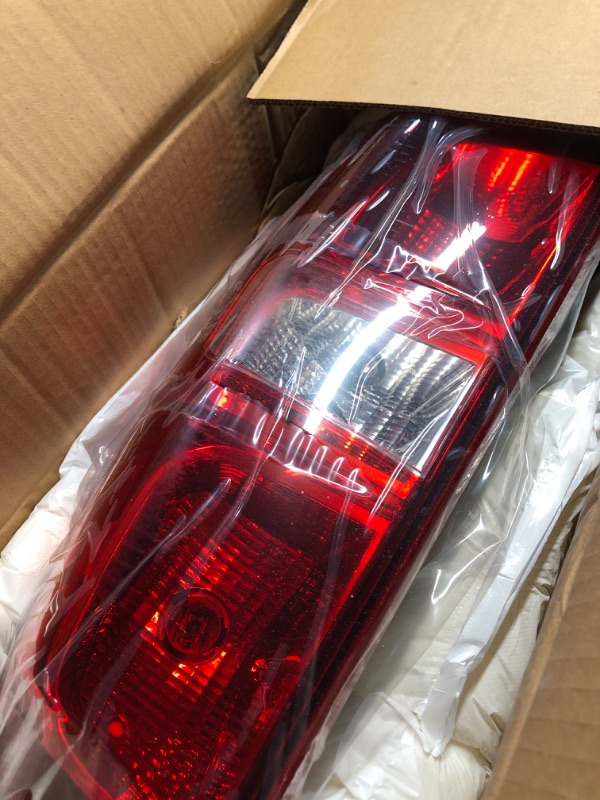 Photo 2 of ***USED - LIKELY MISSING PARTS - UNABLE TO VERIFY FUNCTIONALITY***
9028861 Passenger Side Chrome & Red Factory Style Tail Light for 2007-2013 Chevy Suburban