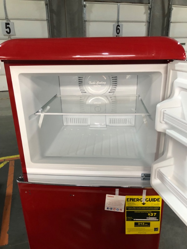 Photo 6 of ***USED - MAJOR DAMAGE - NO PACKAGING - UNTESTED - SEE COMMENTS***
Galanz GLR12TRDEFR Refrigerator, Dual Door Fridge, Adjustable Electrical Thermostat Control with Top Mount Freezer Compartment, Retro Red, 12.0 Cu Ft
