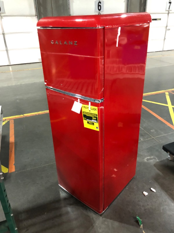 Photo 7 of ***USED - MAJOR DAMAGE - NO PACKAGING - UNTESTED - SEE COMMENTS***
Galanz GLR12TRDEFR Refrigerator, Dual Door Fridge, Adjustable Electrical Thermostat Control with Top Mount Freezer Compartment, Retro Red, 12.0 Cu Ft
