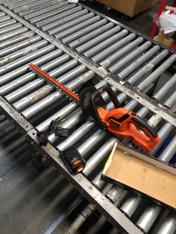 Photo 2 of **MISSING BATTERY**
BLACK+DECKER 20V MAX Cordless Hedge Trimmer, 22 Inch Steel Blade, Reduced Vibration, Battery and Charger Included (LHT2220)
