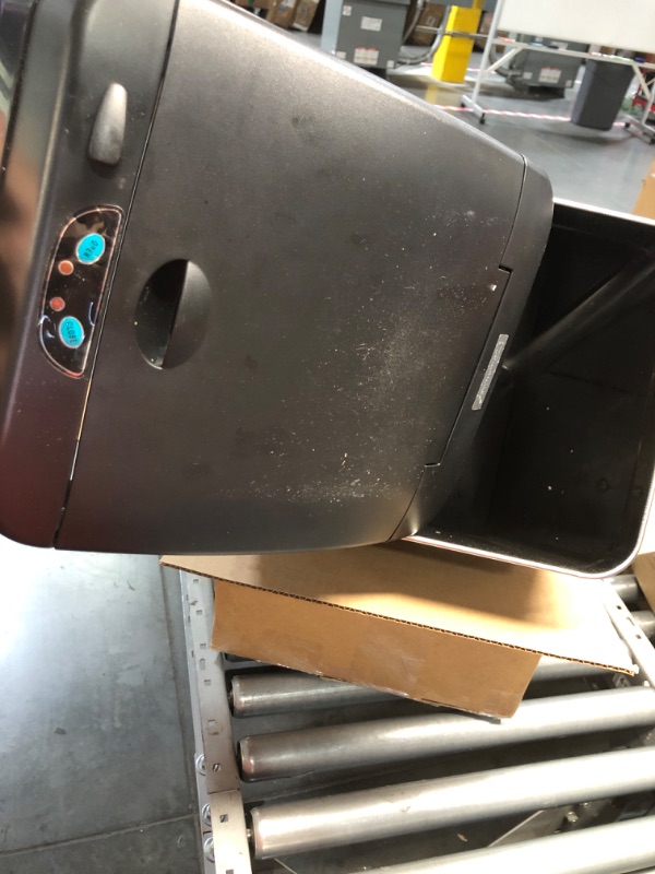 Photo 1 of **General post 
automatic trash can 