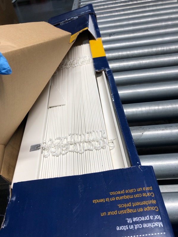 Photo 2 of **BROKEN PIECE** LEVOLOR Trim+Go 2-in Slat Width 35-in x 64-in Cordless White Faux Wood Room Darkening Horizontal Blinds | 2030432