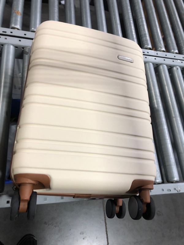 Photo 1 of ***USED - SCRATCHED AND SCRAPED - DOESN'T EXPAND***
Carry On Luggage hard shell Suitcase with Spinner Wheel (20-Inch, Beige)