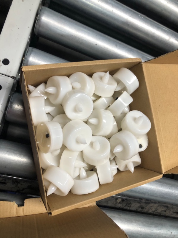 Photo 2 of ***USED - POWERS ON - LIKELY MISSING PARTS***
LED Candles, Tea Lights Candles Battery Operated Bulk, 100PCS Long-Lasting 200 Hours Flameless Tealight Candles, Realistic Flickering Wedding Candles for Festival Decor, 1.5'' D X 1.25'' H Warm White 100-Pack